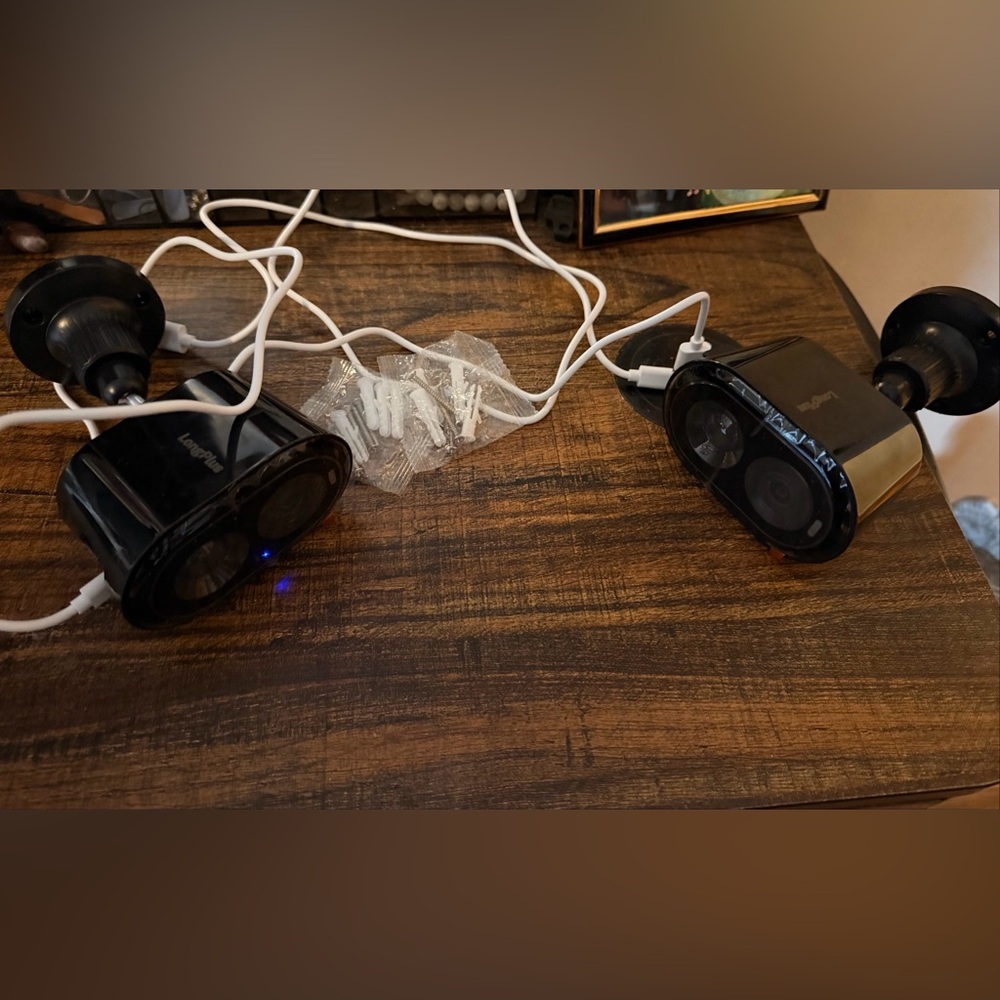 Two wireless Black Security Cameras with USB chips to record